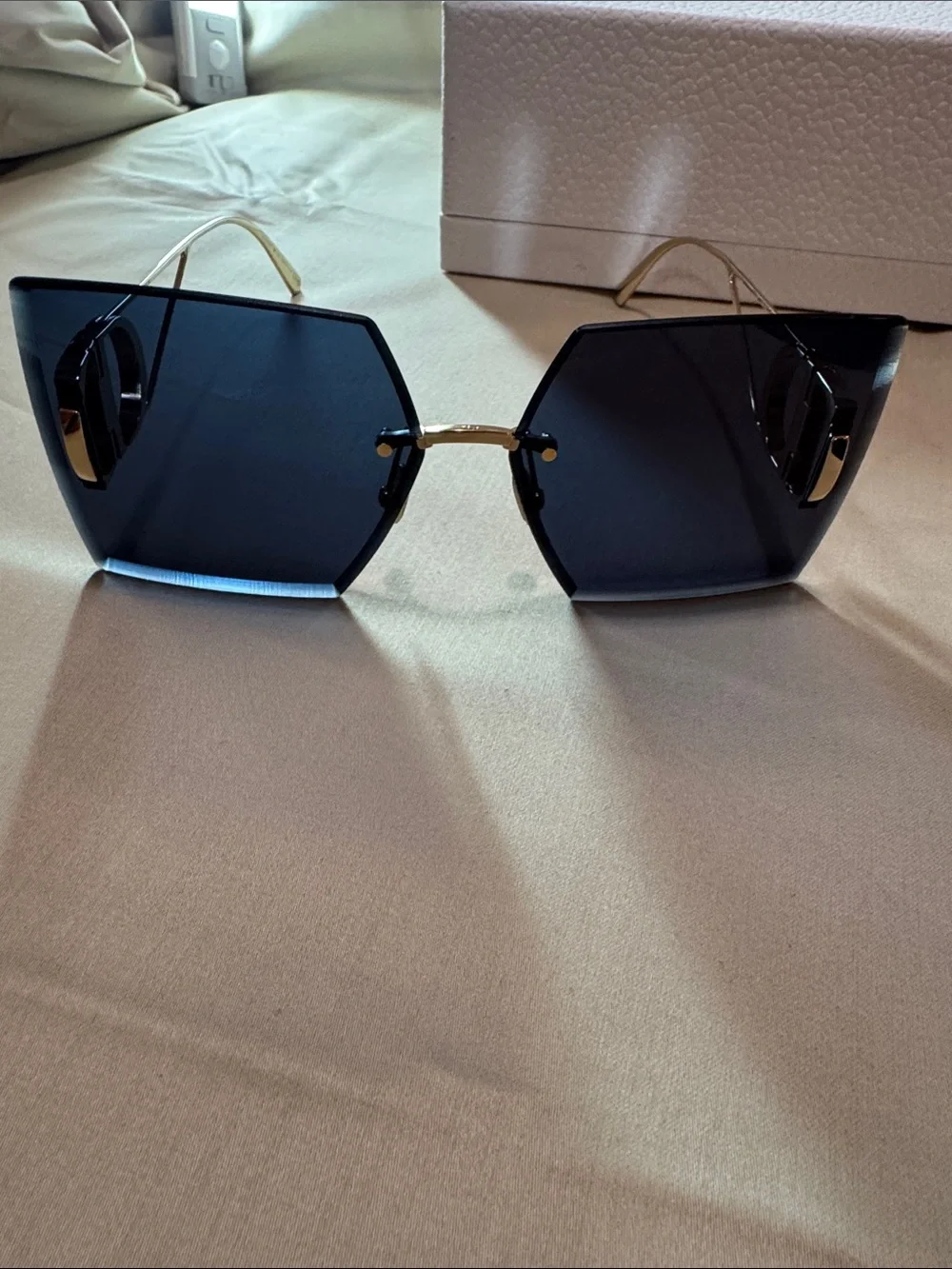 Dior Women's Rimless Sunglasses with Dark Blue Lenses and Gold Temples